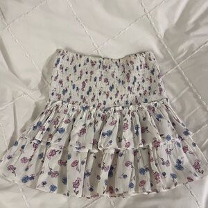 Isabelle’s Cabinet Skylar + Madison white and pink floral smocked mini skirt
